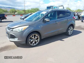 2013 Ford Escape Titanium with VIN 1FMCU0J9XDUC16155, listed as a IAAI auction lot 42373566 with 132,608 mi miles and . Bid and sale history available at DreamBid. Image 2.