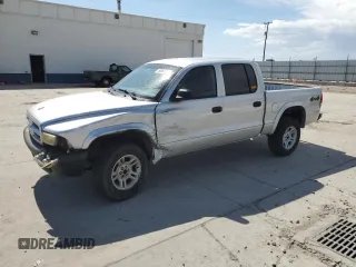 2003 Dodge Dakota Sport z VIN 1D7HG38X03S212560, wystawiony jako Copart lot #59052995 z przebiegiem 271 967 mil mil oraz Szkoda całkowita • Salvage title. Historia ofert i sprzedaży dostępna na DreamBid. Obrazek 1.