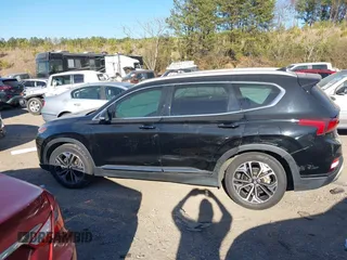 2019 Hyundai Santa Fe Ultimate with VIN 5NMS53AA8KH062025, listed as a IAAI auction lot 41707732 with 84,280 mi miles. Bid and sale history available at carsss.com. Image 14.