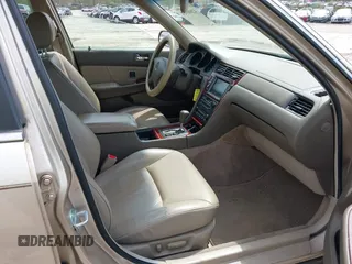 2001 Acura RL w/Navigation System z VIN JH4KA96661C002128, wystawiony jako IAAI lot #42000924 z przebiegiem 180 205 mil mil oraz . Historia ofert i sprzedaży dostępna na DreamBid. Obrazek 5.