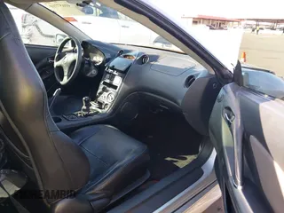 2003 Toyota Celica GT with VIN JTDDR32T230159560, listed as a IAAI auction lot 41657710 with 1 mi miles. Bid and sale history available at carsss.com. Image 5.