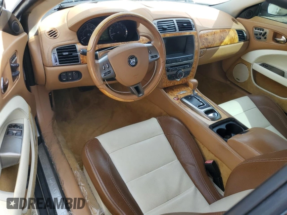 2007 Jaguar XK with VIN SAJDA44B775B05606, listed as a Copart auction lot 49419515 with 115,607 mi miles and Salvage Title. Bid and sale history available at DreamBid. Image 8.
