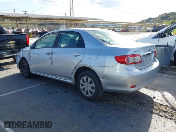 2011 Toyota Corolla L with VIN JTDBU4EE7BJ108265, listed as a IAAI auction lot 41969221 with 104,273 mi miles. Bid and sale history available at carsss.com. Image 3.