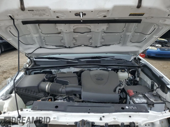 2018 Toyota Tacoma SR z VIN 3TMCZ5AN5JM181489, wystawiony jako Copart lot #55696365 z przebiegiem 70 091 mil mil oraz Szkoda całkowita • Salvage title. Historia ofert i sprzedaży dostępna na DreamBid. Obrazek 11.
