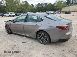 2025 Toyota Camry LE with VIN 4T1DAACKXSU556874, listed as a Copart auction lot 52694525 with 7,076 mi miles and Salvage Title. Bid and sale history available at carsss.com. Image 2.