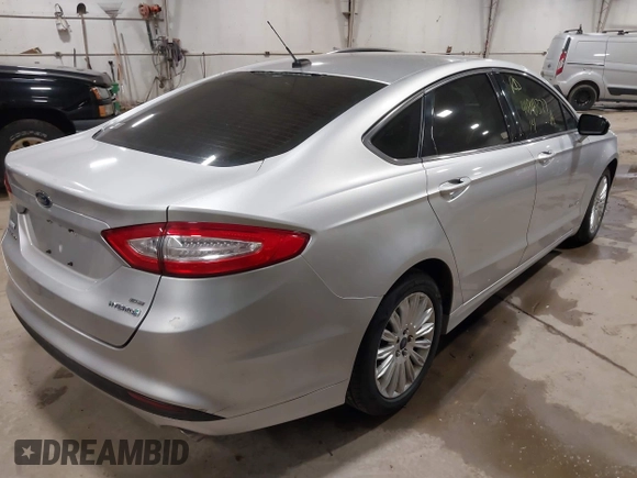2014 Ford Fusion SE Hybrid with VIN 3FA6P0LU8ER183231, listed as a IAAI auction lot 41848377 with 130,496 mi miles. Bid and sale history available at carsss.com. Image 4.