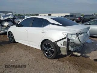 2021 Nissan Sentra SR z VIN 3N1AB8DV8MY248742, wystawiony jako IAAI lot #42034660 z przebiegiem 47 801 mil mil oraz . Historia ofert i sprzedaży dostępna na DreamBid. Obrazek 3.