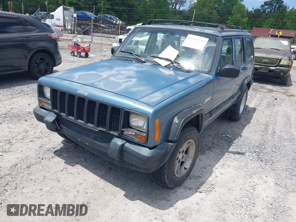 1998 Jeep Cherokee Sport with VIN 1J4FT68S6WL272337, listed as a IAAI auction lot 42147195 with 302,764 mi miles. Bid and sale history available at carsss.com. Image 2.