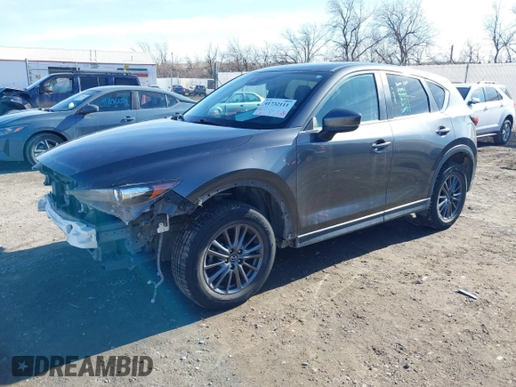 2019 Mazda CX-5 Touring with VIN JM3KFBCM7K0611896, listed as a IAAI auction lot 41732111 with 90,826 mi miles. Bid and sale history available at carsss.com. Image 2.