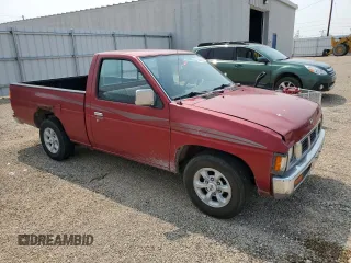 1997 Nissan Frontier XE with VIN 1N6SD11S5VC403526, listed as a Copart auction lot 58222295 with 127,211 mi miles and Clean title. Bid and sale history available at DreamBid. Image 4.