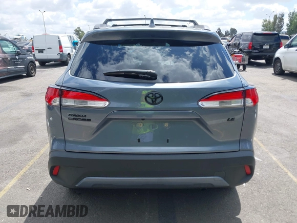 2022 Toyota Corolla Cross LE with VIN 7MUBAAAG1NV004852, listed as a IAAI auction lot 42251301 with 50,197 mi miles and . Bid and sale history available at DreamBid. Image 17.