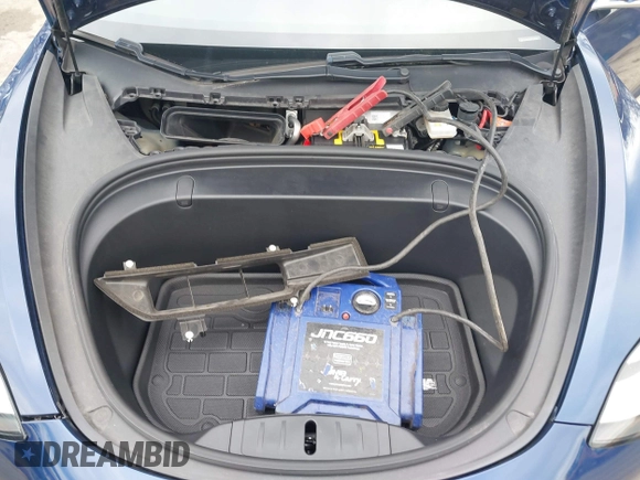 2019 Tesla Model 3 Mid Range with VIN 5YJ3E1EA5KF299589, listed as a IAAI auction lot 41709733 with 50,256 mi miles and . Bid and sale history available at DreamBid. Image 10.