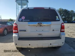 2010 Ford Escape Hybrid with VIN 1FMCU4K38AKB79549, listed as a Copart auction lot 57293035 with 83,742 mi miles and Salvage title. Bid and sale history available at DreamBid. Image 6.