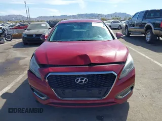 2016 Hyundai Sonata Hybrid SE with VIN KMHE24L18GA038247, listed as a IAAI auction lot 41603106 with 208,891 mi miles. Bid and sale history available at carsss.com. Image 12.