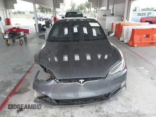 2021 Tesla Model S Long Range Plus with VIN 5YJSA1E28MF421655, listed as a IAAI auction lot 42407234 with 111,443 mi miles and . Bid and sale history available at DreamBid. Image 12.