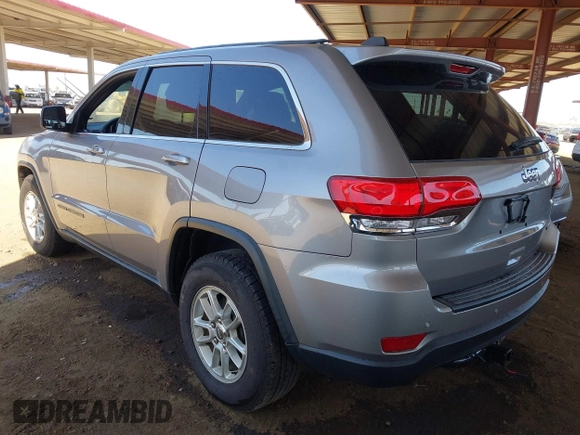 2018 Jeep Grand Cherokee Laredo E with VIN 1C4RJEAG3JC399869, listed as a IAAI auction lot 42305627 with 64,004 mi miles and . Bid and sale history available at DreamBid. Image 3.