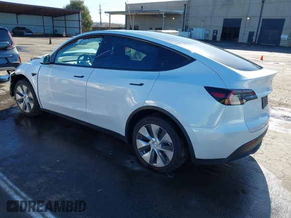 2022 Tesla Model Y Long Range with VIN 7SAYGDEE1NF402745, listed as a IAAI auction lot 41493850 with 11,222 mi miles and . Bid and sale history available at DreamBid. Image 3.