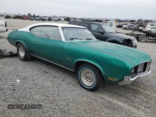 1972 Oldsmobile Cutlass with VIN 3G87H2M101964, listed as a Copart auction lot 70458154 with 25,469 mi miles and Salvage Title. Bid and sale history available at DreamBid. Image 4.