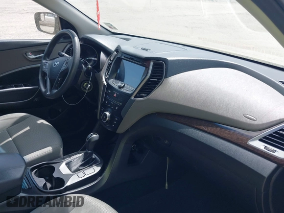 2018 Hyundai Santa Fe 2.4L with VIN 5XYZT3LB4JG557373, listed as a IAAI auction lot 42511741 with 142,572 mi miles and . Bid and sale history available at DreamBid. Image 12.