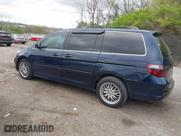 2007 Honda Odyssey EX-L with VIN 5FNRL38737B031255, listed as a IAAI auction lot 42040035 with 233,369 mi miles. Bid and sale history available at carsss.com. Image 3.