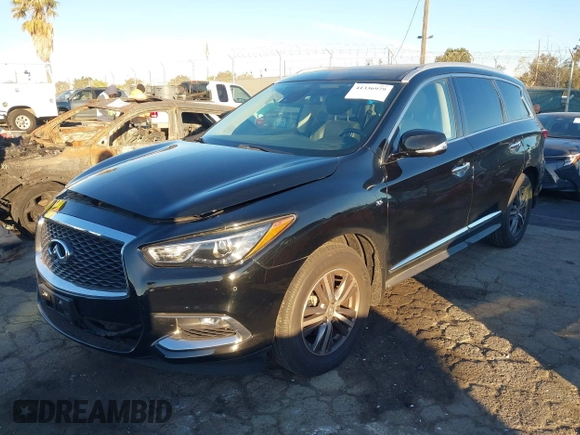 2020 Infiniti QX60 Pure with VIN 5N1DL0MNXLC505914, listed as a IAAI auction lot 41336979 with 53,813 mi miles and . Bid and sale history available at DreamBid. Image 2.