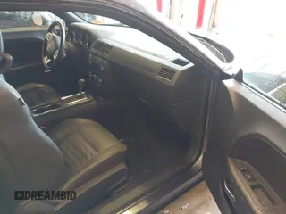 2013 Dodge Challenger SXT z VIN 2C3CDYAG9DH629189, wystawiony jako IAAI lot #41374015 z przebiegiem Nie podano mil oraz . Historia ofert i sprzedaży dostępna na DreamBid. Obrazek 5.
