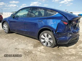 2023 Tesla Model Y Long Range z VIN 7SAYGDEE3PA178832, wystawiony jako Copart lot #57156005 z przebiegiem 12 920 mil mil oraz Szkody całkowita. Historia ofert i sprzedaży dostępna na DreamBid. Obrazek 2.
