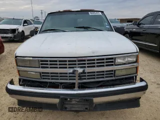 1999 Chevrolet Suburban with VIN 1GNEC16R7XJ418169, listed as a Copart auction lot 88995495 with 2,015,240 mi miles and Salvage title. Bid and sale history available at DreamBid. Image 5.
