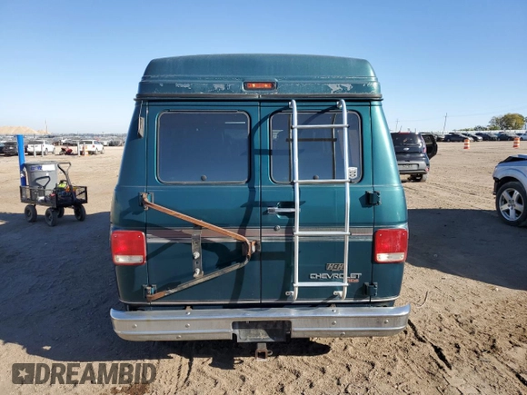 1995 Chevrolet Chevy Van z VIN 1GBEG25K3SF249372, wystawiony jako Copart lot #72284224 z przebiegiem 72 331 mil mil oraz Tytuł czysty. Historia ofert i sprzedaży dostępna na DreamBid. Obrazek 6.