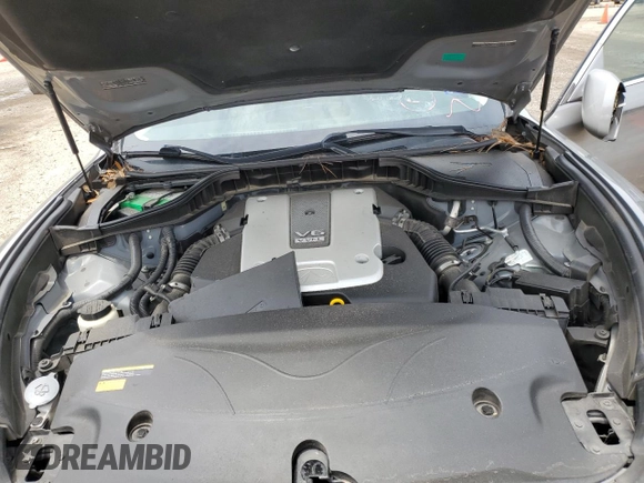 2013 Infiniti M z VIN JN1BY1AP8DM513632, wystawiony jako Copart lot #41443245 z przebiegiem 151 701 mil mil oraz Szkoda całkowita • Salvage title. Historia ofert i sprzedaży dostępna na DreamBid. Obrazek 11.