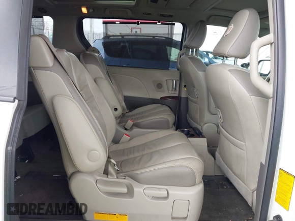 2011 Toyota Sienna XLE AAS with VIN 5TDYK3DC8BS148948, listed as a IAAI auction lot 41806293 with 144,645 mi miles and . Bid and sale history available at DreamBid. Image 8.