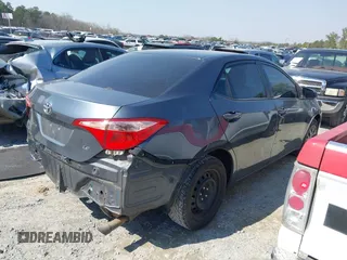 2019 Toyota Corolla L with VIN 2T1BURHE4KC134729, listed as a IAAI auction lot 41779629 with 240,685 mi miles. Bid and sale history available at carsss.com. Image 4.