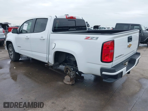 2019 Chevrolet Colorado 4WD Z71 z VIN 1GCGTDEN3K1317883, wystawiony jako IAAI lot #41439010 z przebiegiem 34 306 mil mil oraz . Historia ofert i sprzedaży dostępna na DreamBid. Obrazek 3.