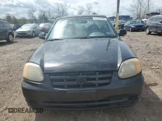 2004 Hyundai Accent GL with VIN KMHCG45C04U506196, listed as a Copart auction lot 51276195 with 75,550 mi miles and Clean Title. Bid and sale history available at carsss.com. Image 5.