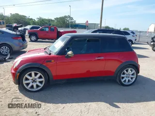 2006 MINI Hardtop with VIN WMWRC33506TK17012, listed as a IAAI auction lot 42076648 with 101,852 mi miles and . Bid and sale history available at DreamBid. Image 14.