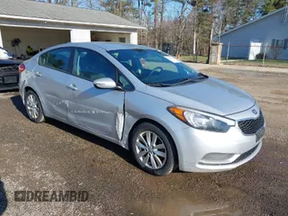 2016 Kia Forte LX with VIN KNAFX4A66G5471080, listed as a IAAI auction lot 41812751 with 57,686 mi miles. Bid and sale history available at carsss.com. Image 1.