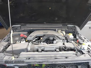 2020 Jeep Wrangler Unlimited Black and Tan с VIN 1C4HJXDG3LW266615, выставлен на аукционе IAAI как лот 42207899 с пробегом 55 291 миль миль и . История ставок и продаж доступна на DreamBid. Изображение 10.