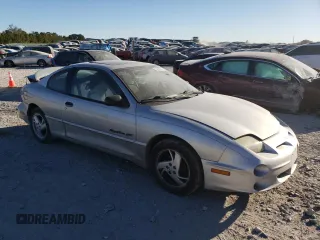 2002 Pontiac Sunfire z VIN 1G2JD12T627123970, wystawiony jako Copart lot #73338004 z przebiegiem 175 688 mil mil oraz Nie do naprawy. Historia ofert i sprzedaży dostępna na DreamBid. Obrazek 4.