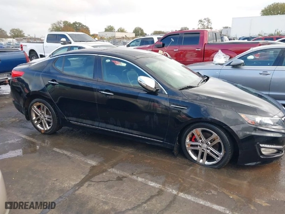 2013 Kia Optima SX w/Limited Pkg with VIN 5XXGR4A6XDG121265, listed as a IAAI auction lot 40771144 with 129,247 mi miles. Bid and sale history available at carsss.com. Image 13.
