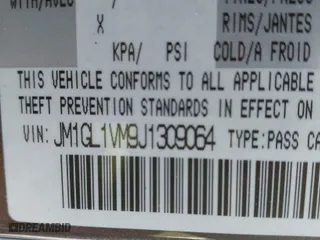 2018 Mazda Mazda6 Touring with VIN JM1GL1VM9J1309064, listed as a IAAI auction lot 41883495 with 250,781 mi miles. Bid and sale history available at carsss.com. Image 9.