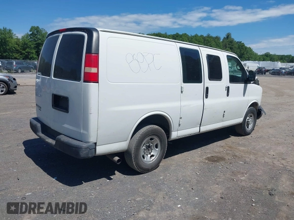 2014 Chevrolet Express Cargo Van with VIN 1GCWGFCA2E1210307, listed as a IAAI auction lot 39559260 with 213,814 mi miles. Bid and sale history available at carsss.com. Image 4.