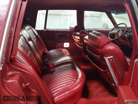1988 Cadillac Brougham z VIN 1G6DW51Y2JR766782, wystawiony jako Copart lot #83797924 z przebiegiem 63 601 mil mil oraz Szkody całkowita. Historia ofert i sprzedaży dostępna na DreamBid. Obrazek 10.