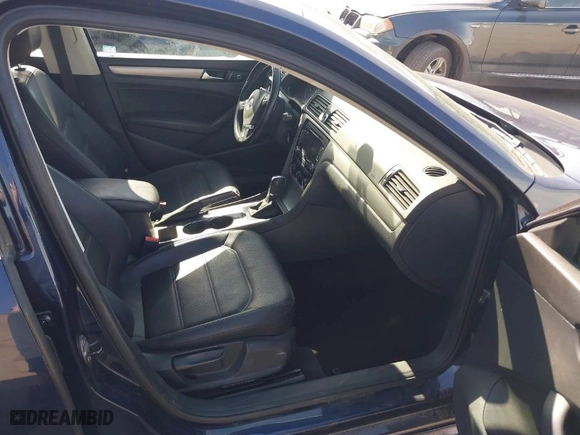 2014 Volkswagen Passat TDI SE w/Sunroof with VIN 1VWBN7A30EC055207, listed as a IAAI auction lot 41893637 with 133,074 mi miles. Bid and sale history available at carsss.com. Image 5.
