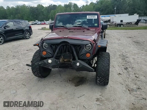 2007 Jeep Wrangler Unlimited X with VIN 1J4GA39187L161451, listed as a Copart auction lot 55280905 with 214,660 mi miles and Salvage Title. Bid and sale history available at DreamBid. Image 15.