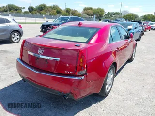 2009 Cadillac CTS RWD w/1SA with VIN 1G6DF577290142964, listed as a IAAI auction lot 42017475 with 171,696 mi miles. Bid and sale history available at carsss.com. Image 6.