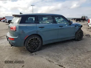 2023 MINI Clubman Cooper S with VIN WMWLV7C09P2S74537, listed as a Copart auction lot 85036844 with 33,361 mi miles and Salvage Title. Bid and sale history available at carsss.com. Image 3.