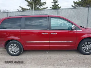 2014 Chrysler Town & Country Touring L with VIN 2C4RC1CGXER307492, listed as a IAAI auction lot 42021290 with 98,845 mi miles and . Bid and sale history available at carsss.com. Image 13.