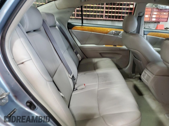 2007 Toyota Avalon XL z VIN 4T1BK36B77U218125, wystawiony jako Copart lot #56042525 z przebiegiem 197 123 mil mil oraz Szkoda całkowita • Salvage title. Historia ofert i sprzedaży dostępna na DreamBid. Obrazek 10.