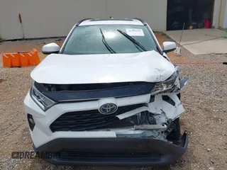 2020 Toyota RAV4 Hybrid XLE with VIN 2T3RWRFV5LW094731, listed as a IAAI auction lot 42349123 with 60,927 mi miles and . Bid and sale history available at DreamBid. Image 12.