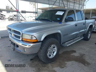 2002 Dodge Dakota SLT with VIN 1B7HG48N62S546119, listed as a IAAI auction lot 41826998 with 157,761 mi miles. Bid and sale history available at carsss.com. Image 2.
